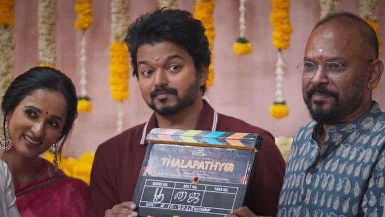 <div class="paragraphs"><p>Actor Vijay flanked by filmmaker Venkat Prabhu and Archana Kalpathi.</p></div>