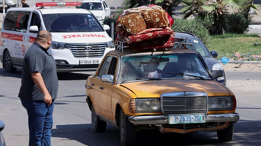 <div class="paragraphs"><p>Palestinians flee their houses heading toward the southern part of Gaza Strip after Israel's call for more than 1 million civilians in northern Gaza to move south within 24 hours, amid the Israeli-Palestinian conflict in Gaza City October 13, 2023. </p></div>