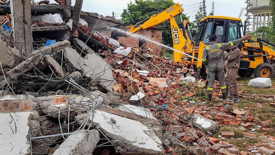 <div class="paragraphs"><p>Firefighters at the site after an explosion at a soap-making factory, at Lohia Nagar in Meerut.</p></div>