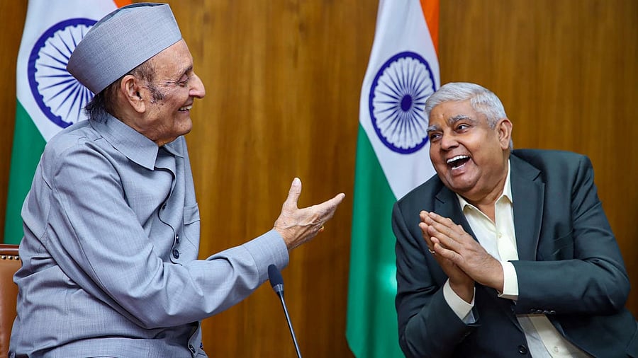 <div class="paragraphs"><p>Congress's Karan Singh (left) seen with current RS Speaker Jagdeep Dhankar, in this picture taken in March 2023. </p></div>