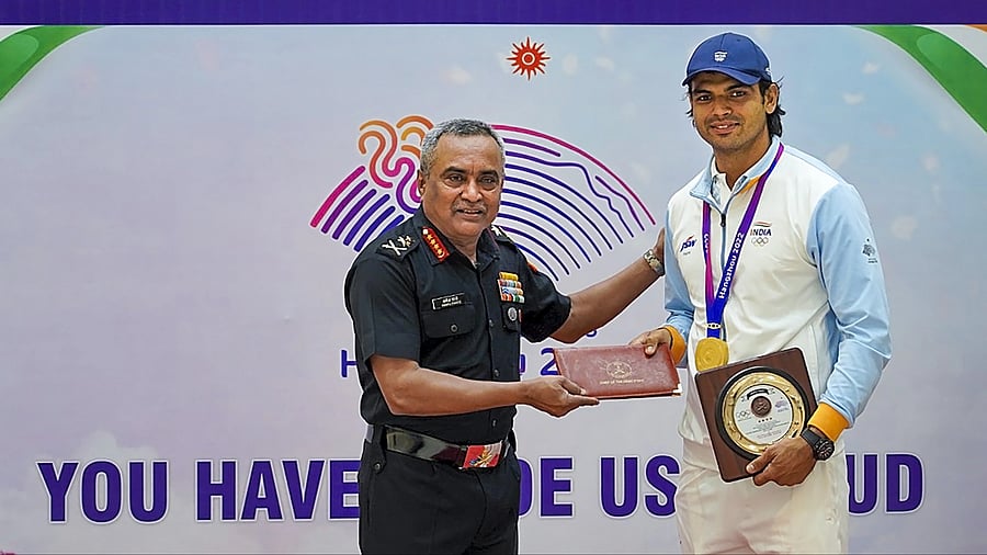 <div class="paragraphs"><p>Chief of Army Staff General Manoj Pande felicitates gold medalist javelin thrower Neeraj Chopra during the felicitation of sportspersons of the Indian Army who participated in the 19th Asian Games, in New Delhi.</p></div>