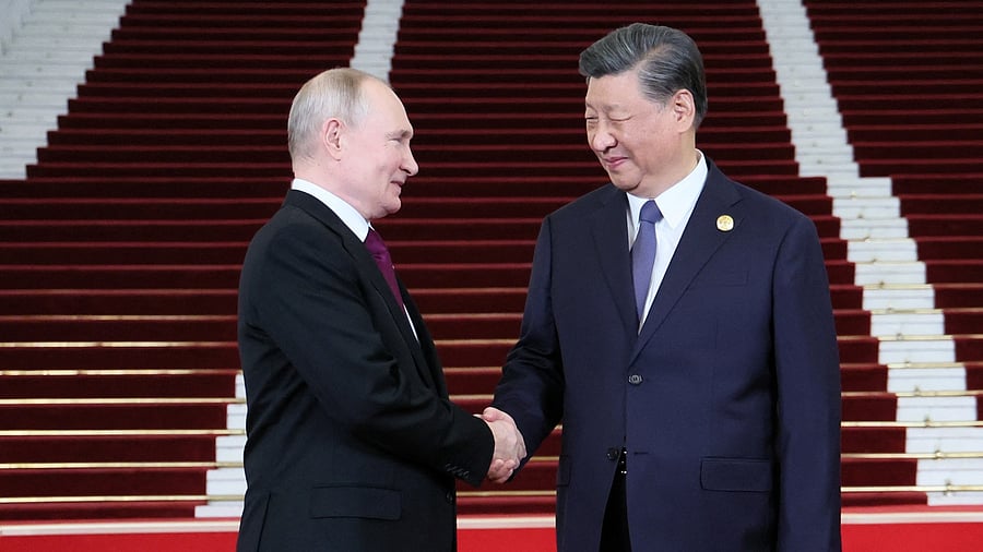 <div class="paragraphs"><p>Russian President Vladimir Putin is welcomed by Chinese President Xi Jinping during a ceremony at the Belt and Road Forum in Beijing, China, October 17, 2023. </p></div>