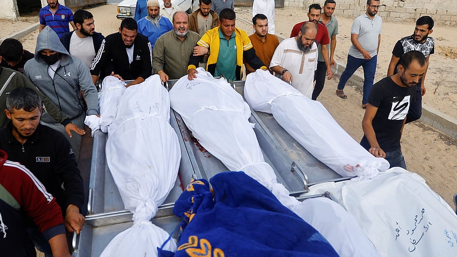 <div class="paragraphs"><p>Mourners attend the funeral of Palestinians from the al-Astal family, who were killed in Israeli strikes, in Khan Younis, in the southern Gaza Strip.</p></div>