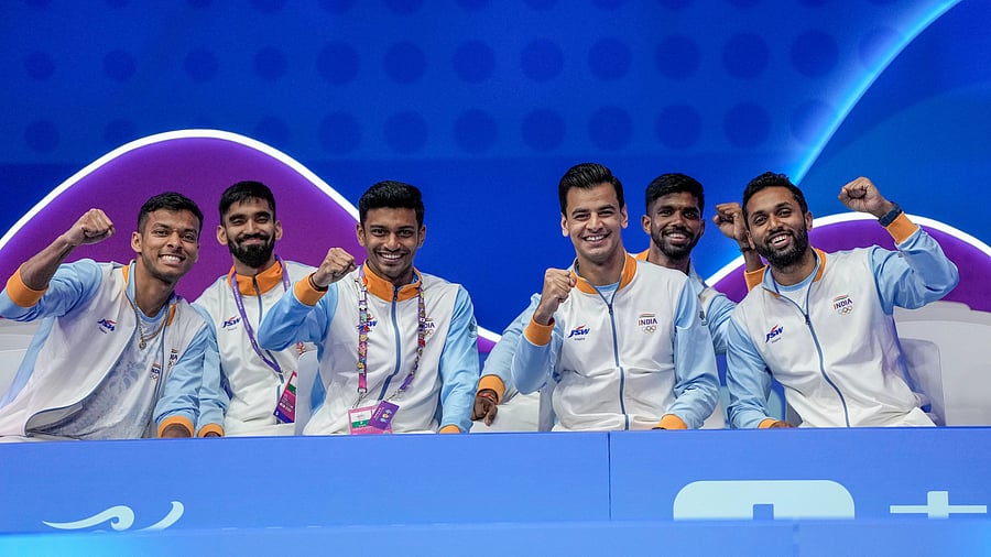 <div class="paragraphs"><p>Indian badminton players Satwiksairaj Rankireddy, Kidambi Srikanth, Rohan Kapoor, Chirag Shetty, Arjun Madathil Ramachandran and HS Prannoy pose for a group photo before the Mens Team Gold Medal badminton match against China at the 19th Asian Games.</p></div>