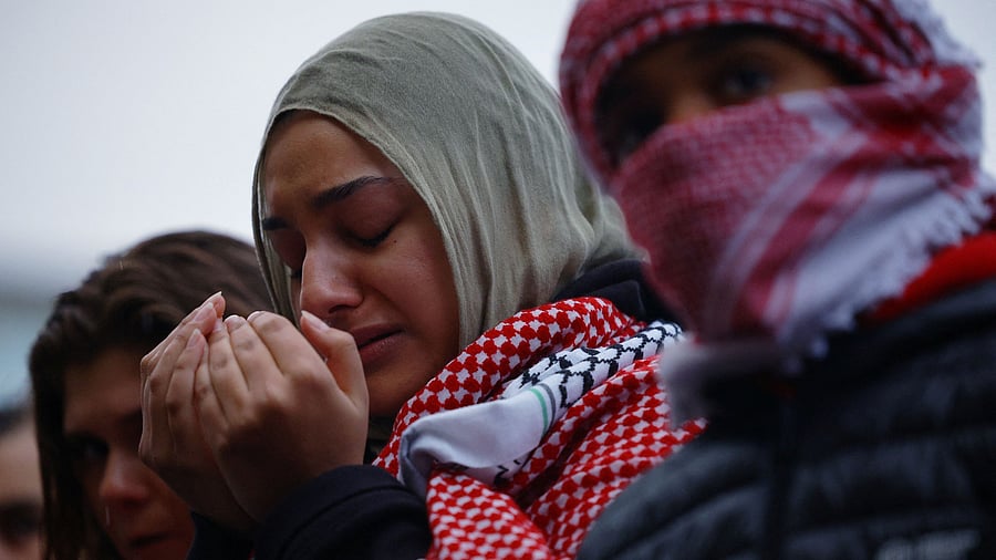<div class="paragraphs"><p>Demonstrators pray together during the "We Won’t Back Down: All Out for Palestine" protest in support of Palestinians, as the conflict between Israel and Hamas continues, in Boston, Massachusetts, US, October 16, 2023.</p></div>