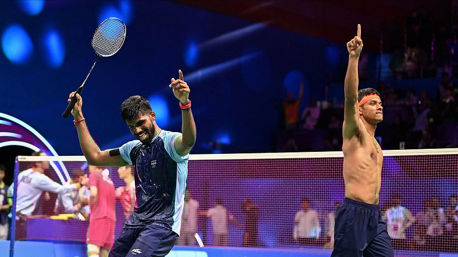 <div class="paragraphs"><p>India's Satwik Sairaj Rankireddy and Chirag Chandrashekhar Shetty celebrate during the Men's Doubles final against South Korea's Choi Solgyu and Kim Wonho at the Asian Games, October 7, 2023.</p></div>