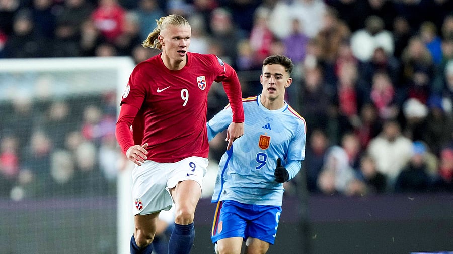 <div class="paragraphs"><p>Norway's Erling Braut Haaland in action with Spain's Gavi</p></div>