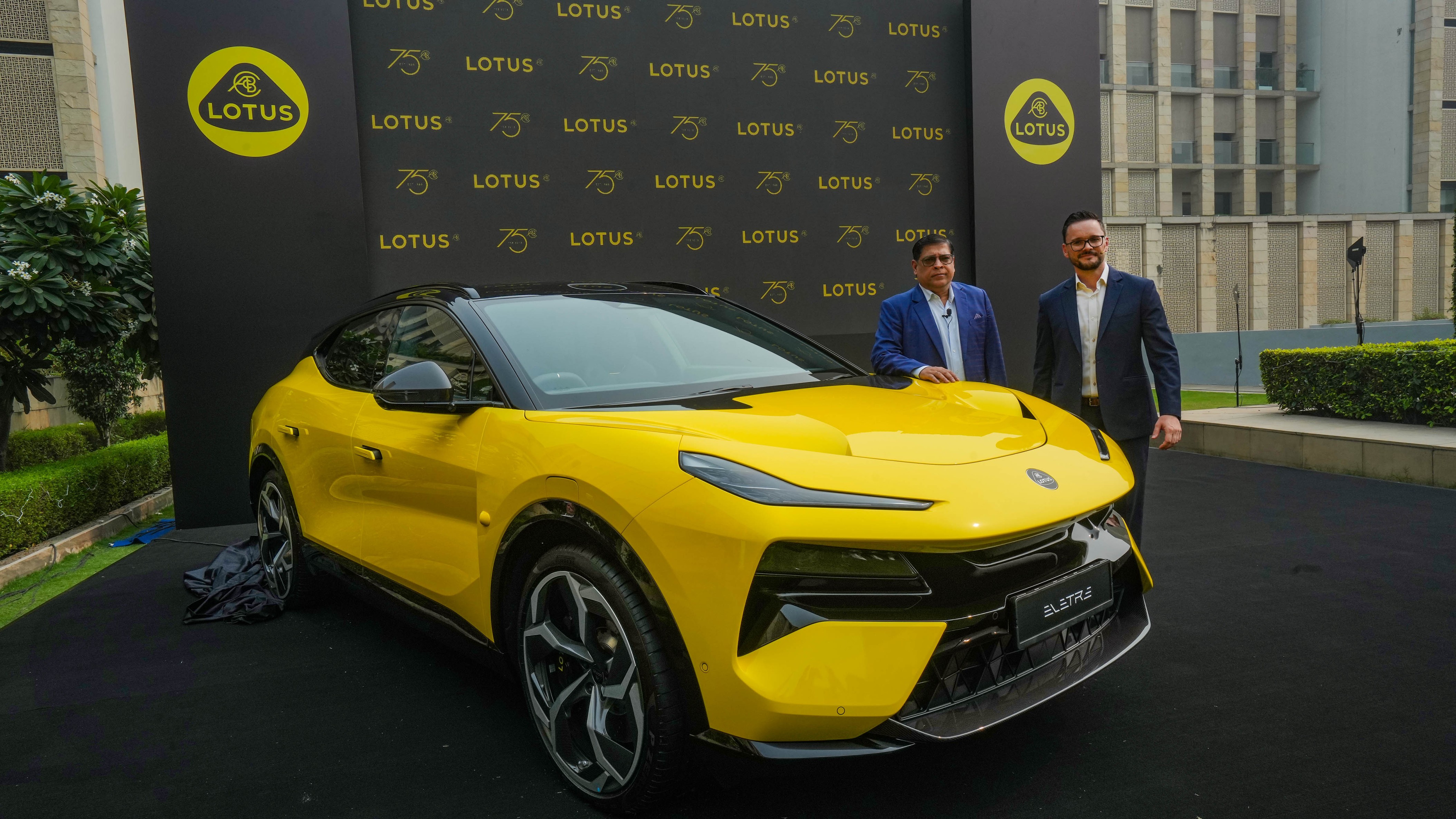 <div class="paragraphs"><p>Lotus Group, Head of After Sales (Asia Pacific, Middle East & Africa) Dominic Baumgart and Exclusive Motors Pvt Ltd MD Satya Prakash Bagla pose for photos during the unveiling of the Lotus' SUV 'Eletre', in New Delhi.</p></div>