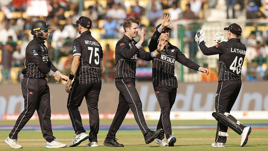 <div class="paragraphs"><p>New Zealand's Lockie Ferguson celebrates with teammates after taking the wicket of Sri Lanka's Chamika Karunaratne </p></div>