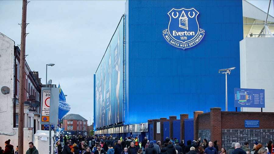 <div class="paragraphs"><p>Fans outside Goodison Park, the stadium of Everton.</p></div>