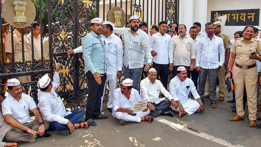 <div class="paragraphs"><p>Maharashtra MLAs stage a protest outside Raj Bhavan to press for Maratha reservation, in Mumbai.&nbsp;</p></div>