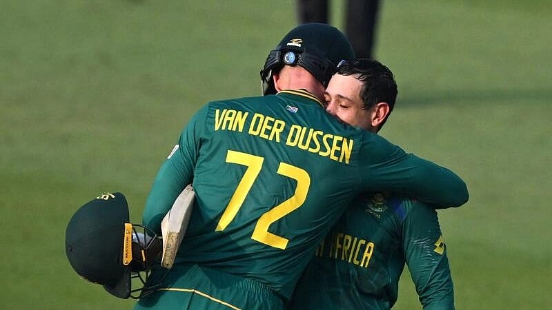 <div class="paragraphs"><p>South Africa's Quinton de Kock (R) celebrates with teammate Rassie van der Dussen after scoring a century</p></div>