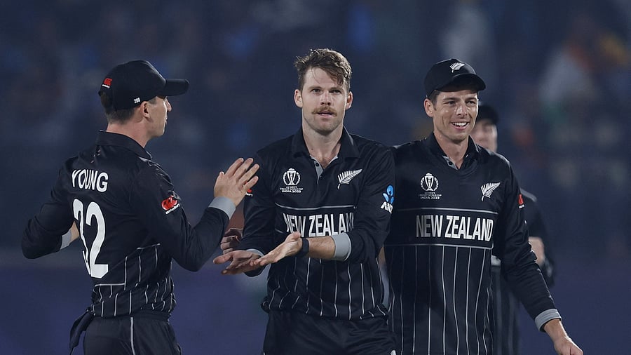 <div class="paragraphs"><p> New Zealand's Lockie Ferguson celebrates with teammates after taking the wicket of India's Shubman.</p></div>