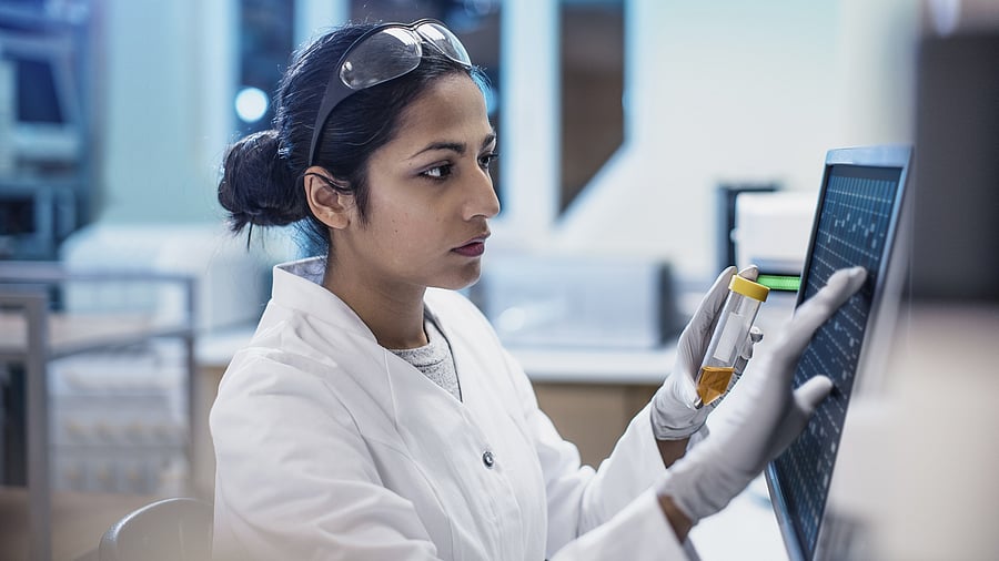 Female Scientist Working in The Lab, Using Computer Screen