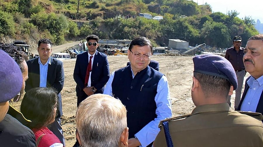 <div class="paragraphs"><p>Uttarakhand Chief Minister Pushkar Singh Dhami reviews the ongoing rescue and relief operations after a portion of a tunnel under construction between Silkyara and Dandalgaon on the Brahmakhal-Yamunotri national highway collapsed, in Uttarkashi district, Monday, Nov. 13, 2023.</p></div>