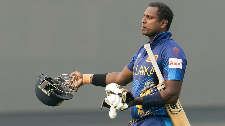 <div class="paragraphs"><p>Sri Lankan batsman Angelo Mathews leaves the ground after being given 'timed out' by umpire during the ICC Cricket World Cup 2023 match between Sri Lanka and Bangladesh, at the Arun Jaitley Cricket Stadium in New Delhi.</p></div>