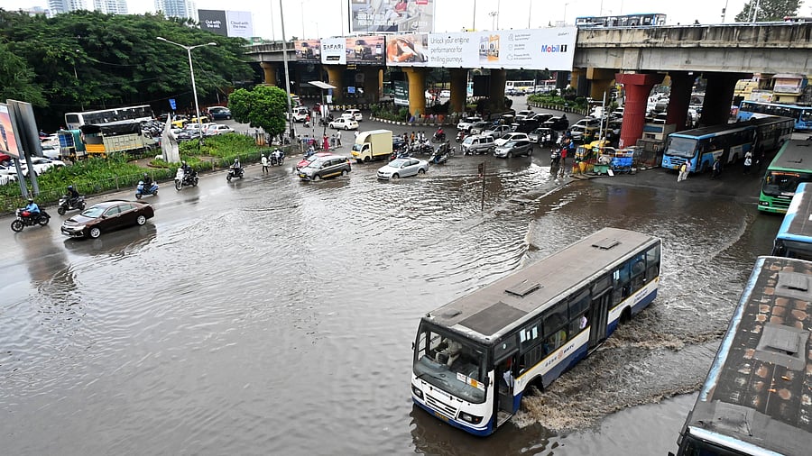 <div class="paragraphs"><p>Hebbal bus stop submerged and a restaurant at Sahakarnagar swamped due to torrential downpour in Bengaluru on Tuesday.</p></div>