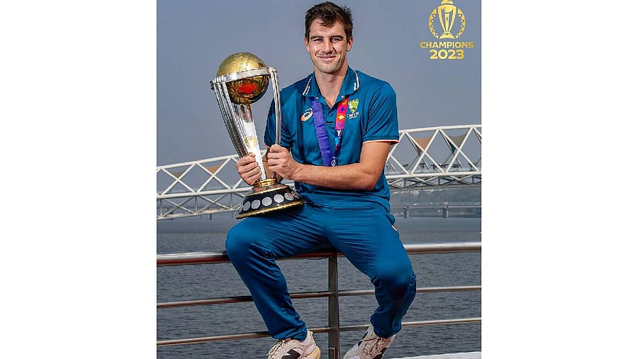 <div class="paragraphs"><p>Australian captain Pat Cummins poses with the ICC Men’s Cricket World Cup trophy during a photo shoot at the Atal Pedestrian Bridge, Sabarmati Riverfront. </p></div>