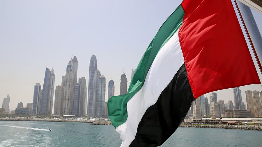 <div class="paragraphs"><p>UAE flag flies over a boat at Dubai Marina, Dubai, United Arab Emirates</p></div>