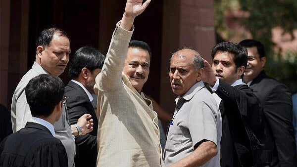 <div class="paragraphs"><p>File photo of&nbsp;Subrata Roy arriving to appear in the Supreme Court for a hearing in a case against him filed by the Securities and Exchange Board of India.</p></div>