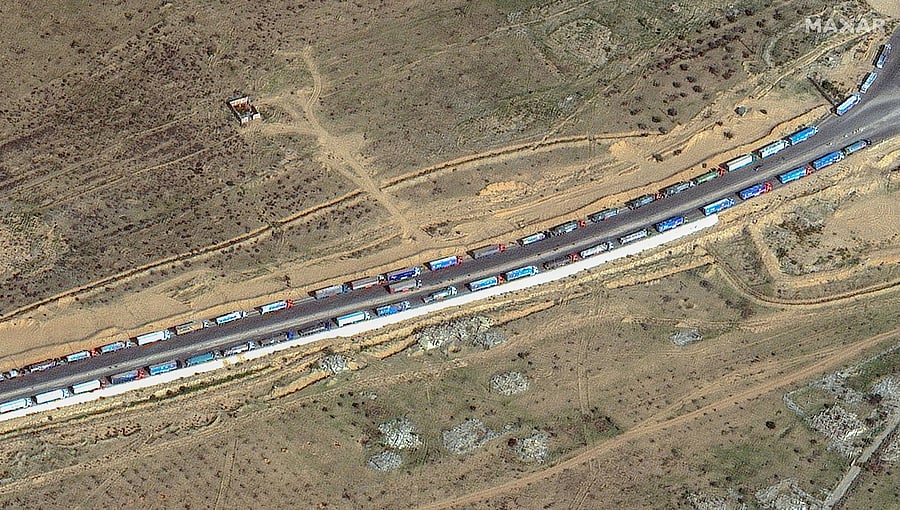 <div class="paragraphs"><p>A satellite image shows vehicles transporting humanitarian aid waiting at the Rafah border crossing between Egypt and the Gaza Strip, during a temporary truce between the Palestinian Islamist group Hamas and Israel, in Rafah, Egypt, November 26, 2023.</p></div>