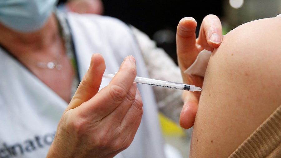 <div class="paragraphs"><p>People receive booster dose of coronavirus disease  vaccine in Antwerp.&nbsp;</p></div>