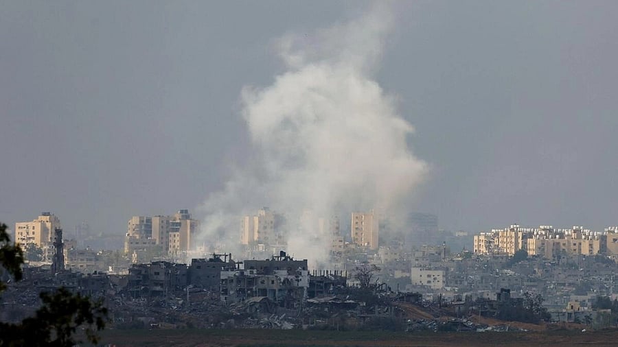 <div class="paragraphs"><p>Smoke rises above Gaza, as seen from southern Israel.</p></div>