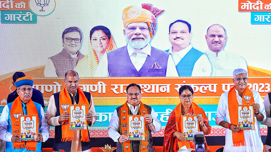 <div class="paragraphs"><p>BJP National President J P Nadda with former Rajasthan chief minister Vasundhara Raje and Union Ministers Arjun Ram Meghwal and Gajendra Singh Shekhawat during the launch of the party's manifesto for the Rajathan Assembly elections, in Jaipur, Thursday, Nov. 16, 2023.</p></div>