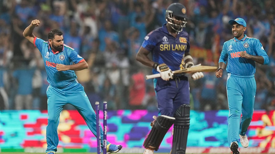 <div class="paragraphs"><p>Mohammed Shami celebrates the wicket of Sri Lanka's Angelo Mathews.</p></div>