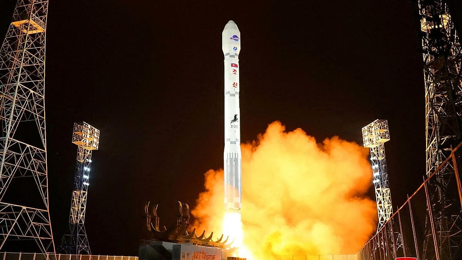 <div class="paragraphs"><p>A rocket carrying a spy satellite Malligyong-1 is launched, as North Korean government claims, in a location given as North Gyeongsang Province.</p></div>