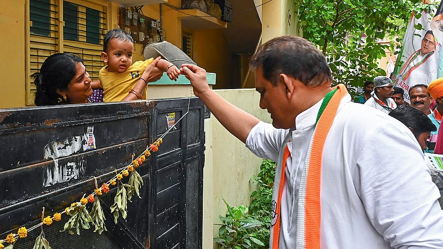 <div class="paragraphs"><p>Congress MP Mohammed Azharuddin interacts with locals during door to door election campaigning at Jubilee Hills constituency ahead of Telangana Assembly elections, in Hyderabad.&nbsp;</p></div>
