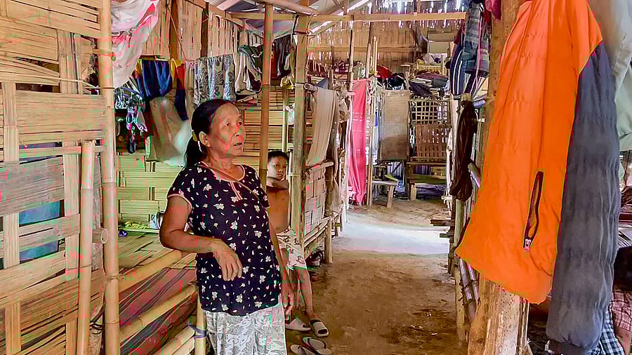 <div class="paragraphs"><p>A woman from Myanmar with her son at a relief camp at Sihhmui village, in Aizawl district, Mizoram. More than 30,000 people, mostly from Chin state in Myanmar, have been living in Mizoram after they fled following a military coup in February 2021.</p></div>