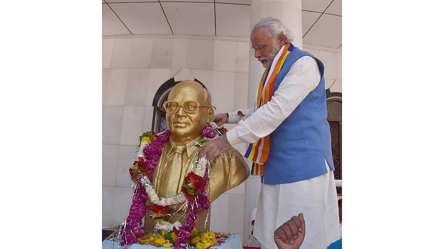 <div class="paragraphs"><p>PM Modi garlands the bust of Dr B R Ambedkar at the Bhim Birthplace Memorial in Madhya Pradesh. </p></div>