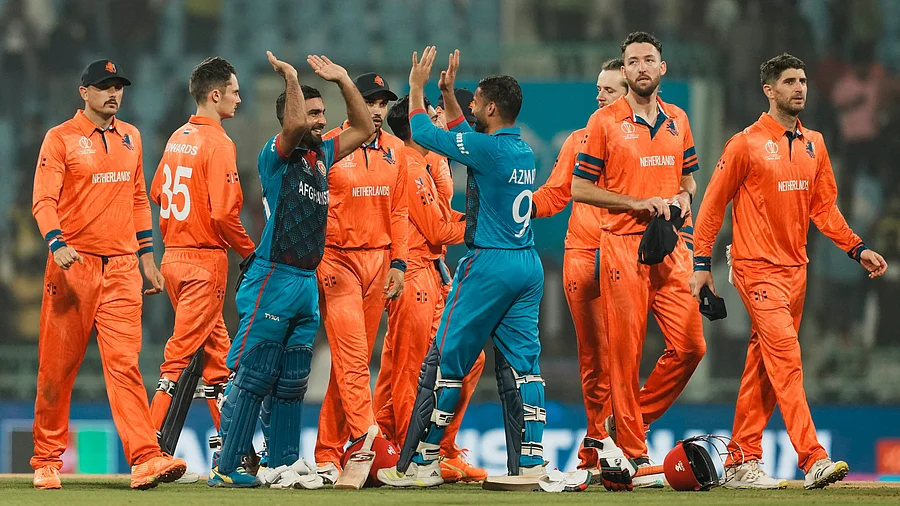 <div class="paragraphs"><p>Afghanistan's batters Hashmatullah Shahidi and Azmatullah Omarzai celebrate after winning the ICC Men's Cricket World Cup 2023 match against Netherlands.</p></div>
