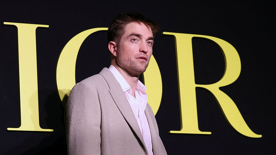 <div class="paragraphs"><p>Robert Pattinson poses during a photocall before Dior Spring/Summer 2024 Women's ready-to-wear collection show during Paris Fashion Week in Paris, France, September 26, 2023. </p></div>