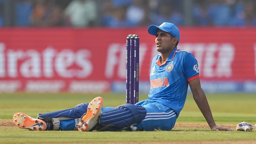 <div class="paragraphs"><p>Shubman Gill sits on the ground after an injury during the ICC Men's Cricket World Cup semifinal match between India and New Zealand, at Wankhede Stadium in Mumbai, Wednesday, Nov. 15, 2023. </p></div>
