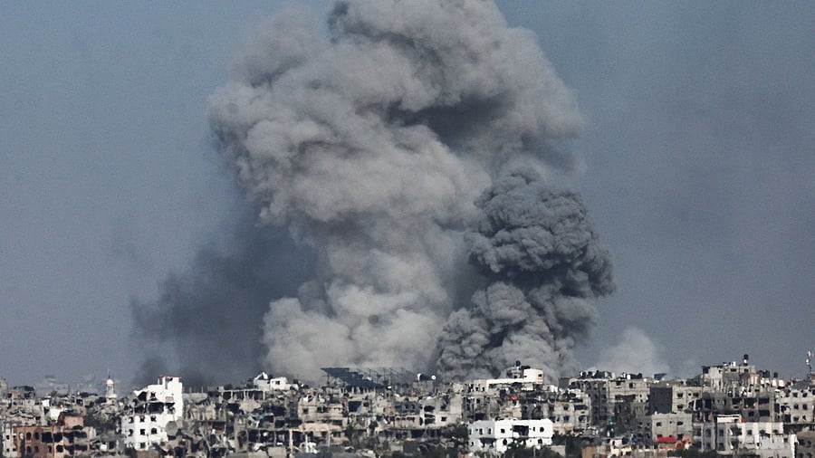 <div class="paragraphs"><p>Smoke rises from an Israeli airstrike in the Gaza Strip.</p></div>