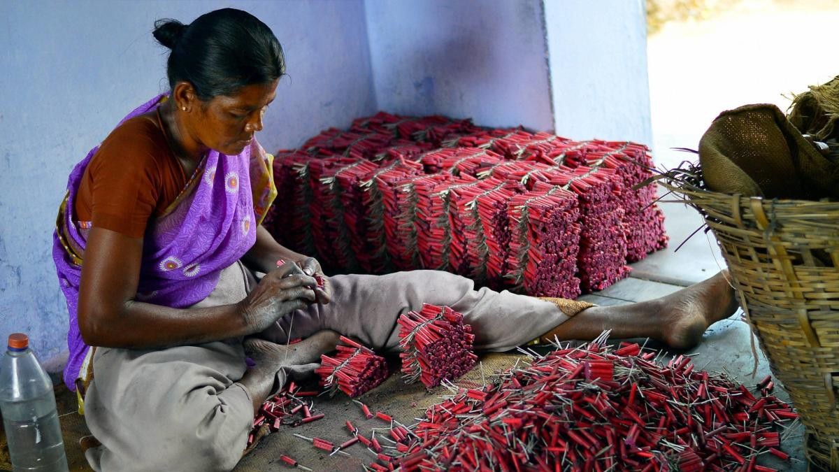 <div class="paragraphs"><p>File photo of a woman employee making crackers at a factory in Sivakasi district in Tamil Nadu.</p></div>