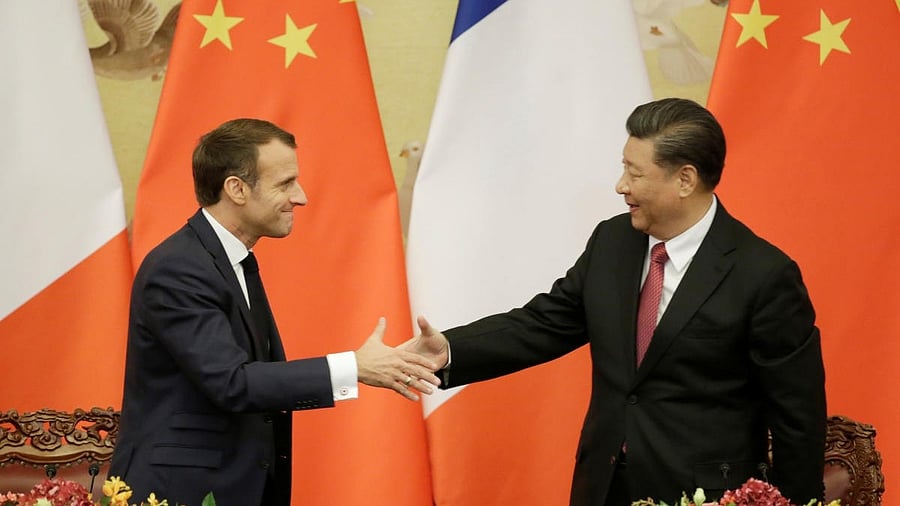 <div class="paragraphs"><p>File Photo of French President Emmanuel Macron shaking hands with China's President Xi Jinping after a joint news conference at the Great Hall of the People in Beijing, China November 6, 2019.&nbsp;</p></div>