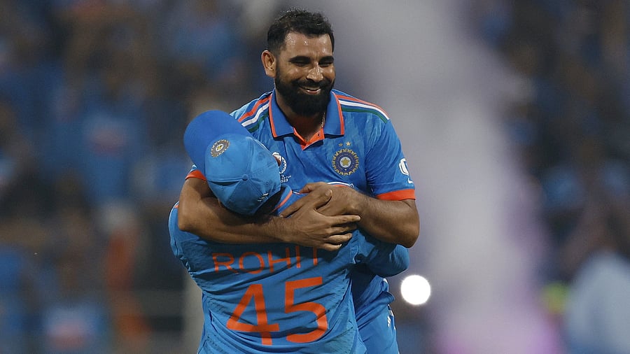 <div class="paragraphs"><p>India's Mohammed Shami celebrates with Rohit Sharma after taking the wicket of New Zealand's Lockie Ferguson to win the match and advance to the finals at the&nbsp;Wankhede Stadium, Mumbai.&nbsp;</p></div>