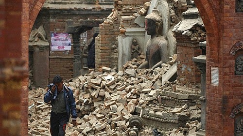<div class="paragraphs"><p>A man cries as he walks on the street while passing through a damaged statue of Lord Buddha a day after an earthquake in Bhaktapur, Nepal April 26, 2015. </p></div>
