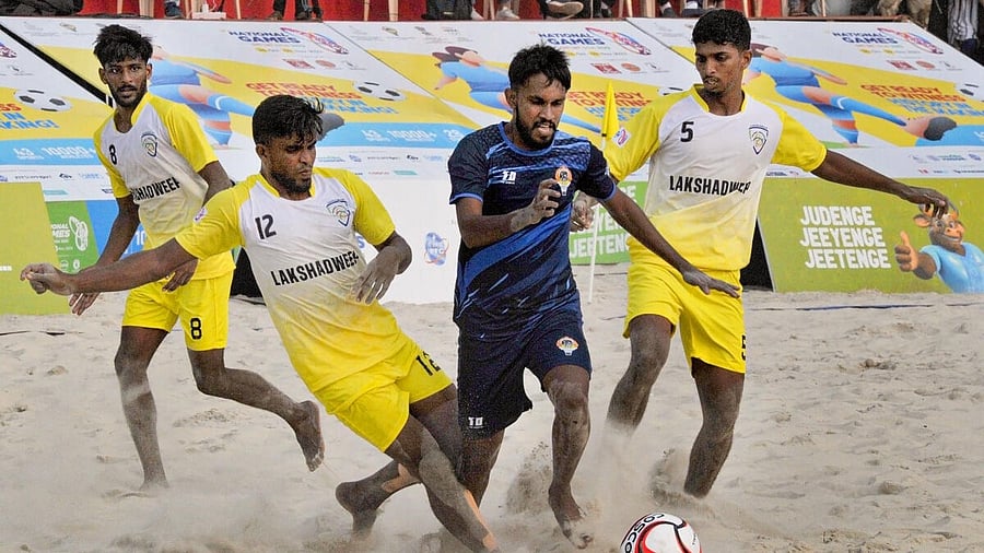 <div class="paragraphs"><p>File photo of players of Goa and Lakshadweep (in yellow) during their beach football match at the 37th National Games, in Goa. </p></div>