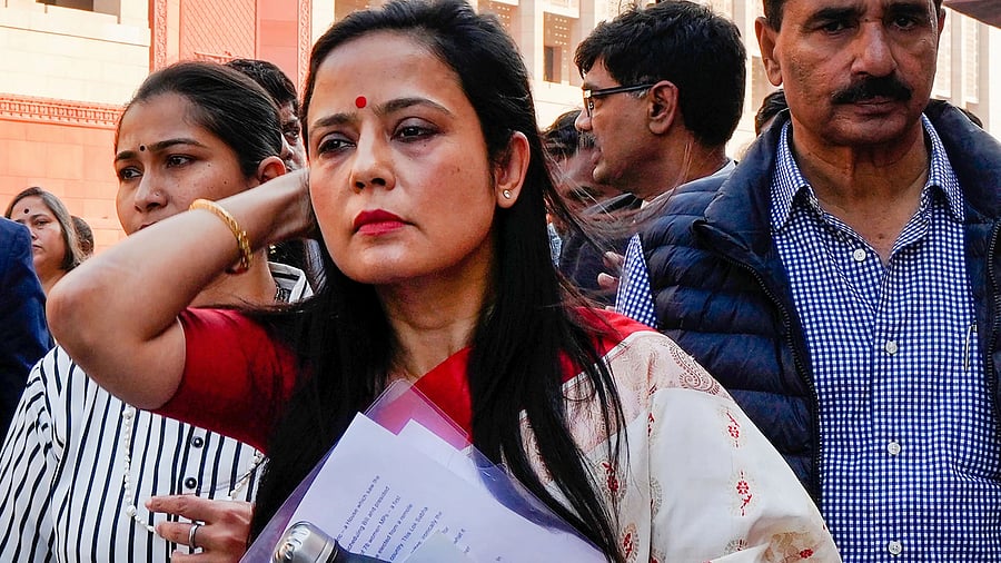 <div class="paragraphs"><p>TMC leader Mahua Moitra with other opposition leaders after being expelled by the Lok Sabha during the Winter session of Parliament, in New Delhi, Friday, Dec. 8, 2023.</p></div>