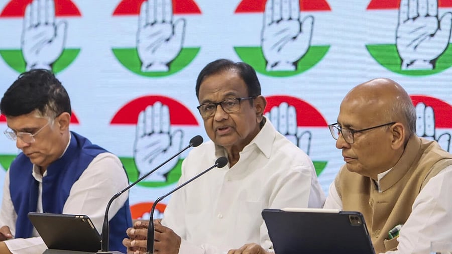 <div class="paragraphs"><p>Congress leaders P Chidambaram and Abhishek Manu Singhvi during a press conference, at party office in New Delhi, Monday, Dec. 11, 2023.</p></div>