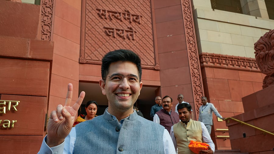 <div class="paragraphs"><p>AAP MP Raghav Chadha flashes the victory sign after his suspension was revoked by Rajya Sabha Chairman Jagdeep Dhankhar</p></div>