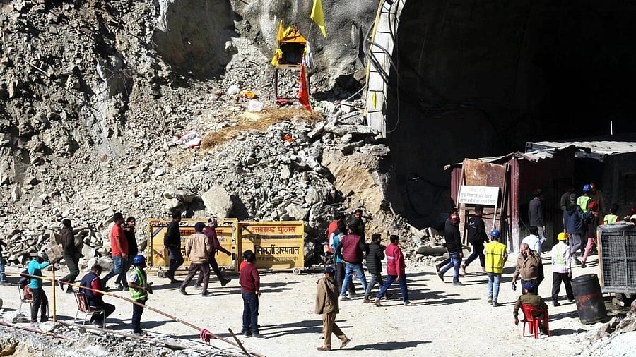 <div class="paragraphs"><p>People at the under-construction Silkyara Bend-Barkot Tunnel after the successful evacuation of the 41 trapped workers, in Uttarkashi district. </p></div>