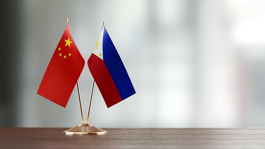 <div class="paragraphs"><p>China and&nbsp;Philippines national flags.</p></div>