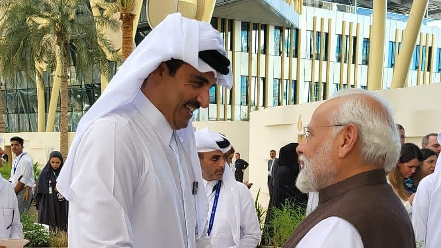 <div class="paragraphs"><p>PM Narendra Modi with Qatar's Amir Sheikh Tamim bin Hamad Al-Thani on the sidelines of COP28. </p></div>