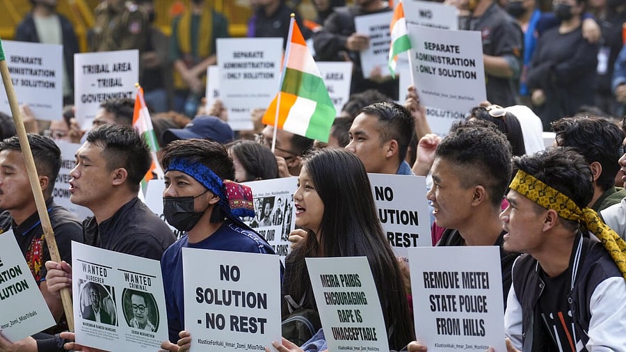 <div class="paragraphs"><p>Unau Tribal Forum members stage a protest demanding a separate administration for Kuki-Zomi-Hmar-Mizo in Manipur, at Jantar Mantar in New Delhi, Wednesday, Nov. 29, 2023.</p></div>