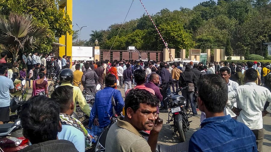<div class="paragraphs"><p> Workers and locals outside a manufacturing unit of Solar Industries after a blast at the factory, at Bazargaon near Nagpur, Sunday, Dec 17, 2023. At least nine people were killed, according to police.</p></div>